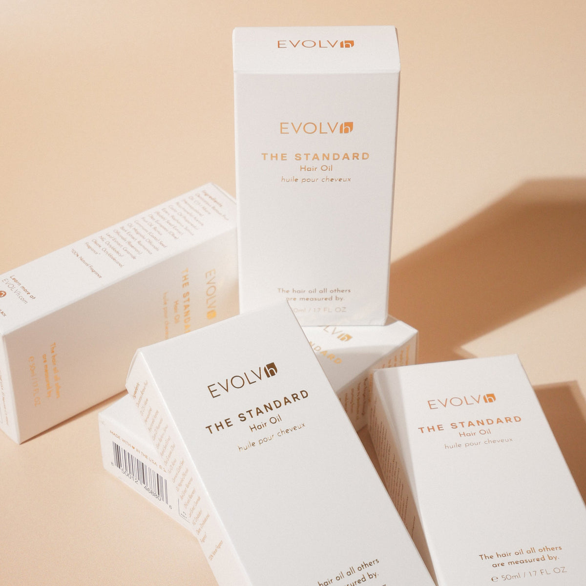 EVOLVh The Standard Hair Oil boxes and bottle packaging